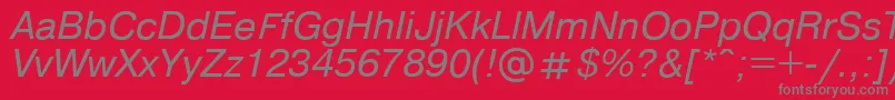 Fonte Pragmaticaregular.KzItalic – fontes cinzas em um fundo vermelho
