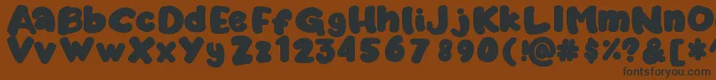 Marshykate Font – Black Fonts on Brown Background