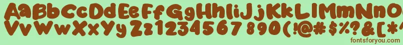 Marshykate Font – Brown Fonts on Green Background