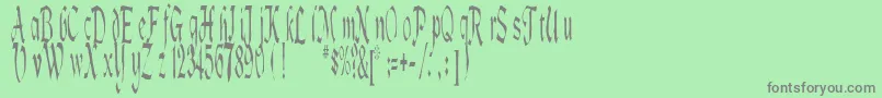 フォントLotharus – 緑の背景に灰色の文字