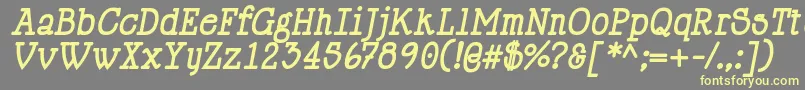 Шрифт HappyPhantomBoldItalic – жёлтые шрифты на сером фоне