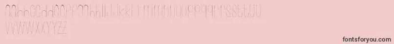 フォントWonderlust – ピンクの背景に黒い文字