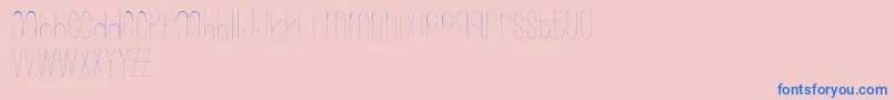 フォントWonderlust – ピンクの背景に青い文字