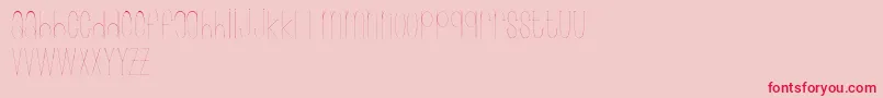 フォントWonderlust – ピンクの背景に赤い文字