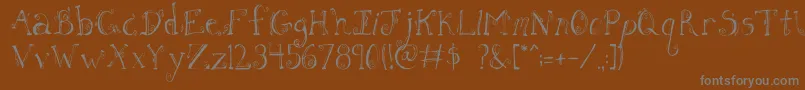 FhLetter Font – Gray Fonts on Brown Background