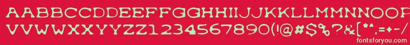 Fonte Typewrong – fontes verdes em um fundo vermelho