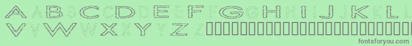 Slurc Font – Gray Fonts on Green Background