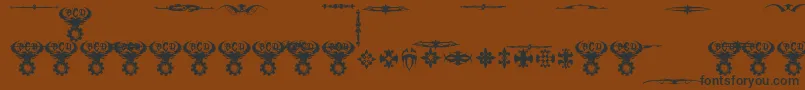 Saiba mais sobre a fonte MarquisDeSadeOrnaments Fonte MarquisDeSadeOrnaments – fontes pretas em um fundo marrom