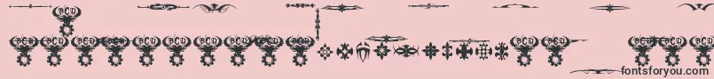 Saiba mais sobre a fonte MarquisDeSadeOrnaments Fonte MarquisDeSadeOrnaments – fontes pretas em um fundo rosa