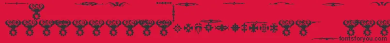 フォントMarquisDeSadeOrnaments – 赤い背景に黒い文字