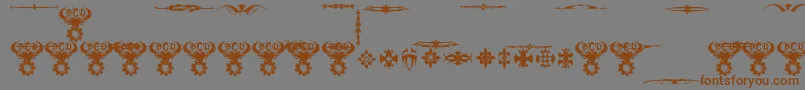 フォントMarquisDeSadeOrnaments – 茶色の文字が灰色の背景にあります。