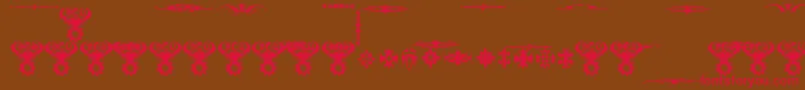 MarquisDeSadeOrnaments Font – Red Fonts on Brown Background