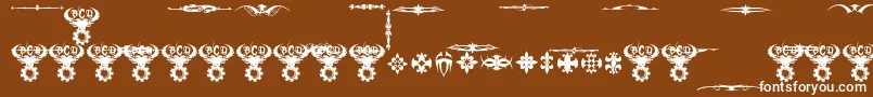MarquisDeSadeOrnaments-fontti – valkoiset fontit ruskealla taustalla
