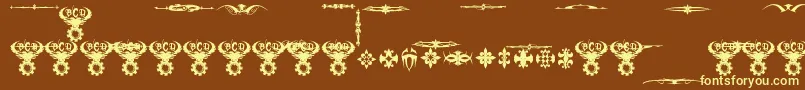 Fonte MarquisDeSadeOrnaments – fontes amarelas em um fundo marrom