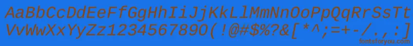 フォントLiberationMonoItalic – 茶色の文字が青い背景にあります。