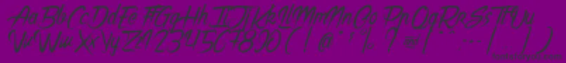 フォントTheNightCreatures2 – 紫の背景に黒い文字