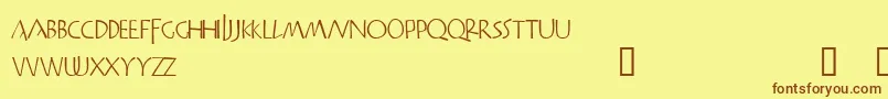 フォントPraitor – 茶色の文字が黄色の背景にあります。