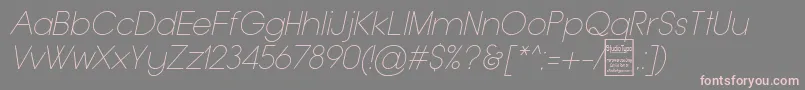 フォントTypoGroteskThinItalicDemo – 灰色の背景にピンクのフォント