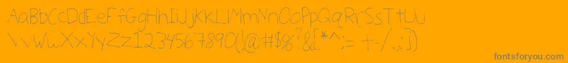 Julialicious-Schriftart – Graue Schriften auf orangefarbenem Hintergrund