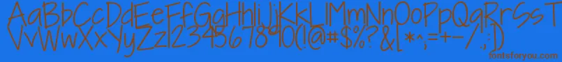 Kgineedafont Font – Brown Fonts on Blue Background