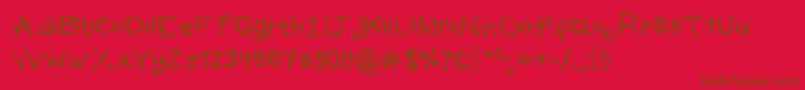 Police Grafipaint – polices brunes sur fond rouge