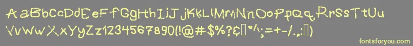 Grafipaint Font – Yellow Fonts on Gray Background