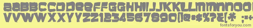 Baveuseink-fontti – harmaat kirjasimet keltaisella taustalla
