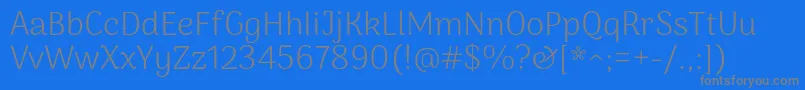 フォントArimakoshiLight – 青い背景に灰色の文字