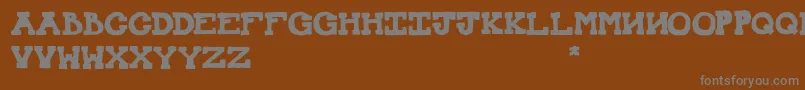 MexicanKnappett Font – Gray Fonts on Brown Background