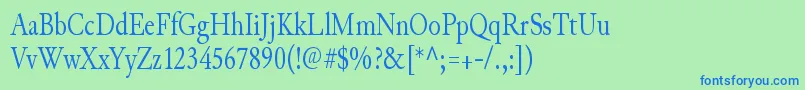 Czcionka JunicodeRegularcondensed – niebieskie czcionki na zielonym tle