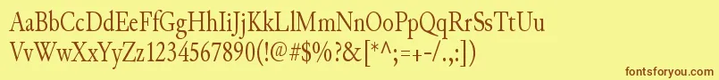 JunicodeRegularcondensed-Schriftart – Braune Schriften auf gelbem Hintergrund