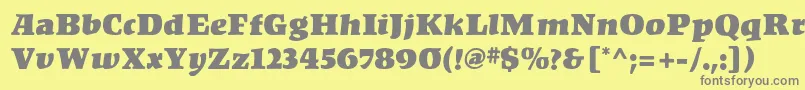 フォントKompakt – 黄色の背景に灰色の文字