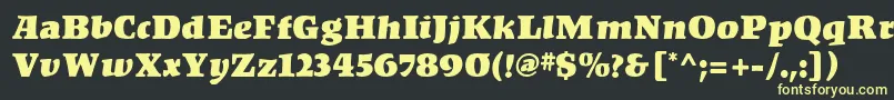 フォントKompakt – 黒い背景に黄色の文字