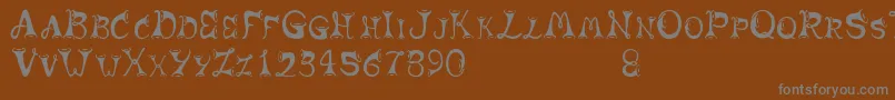 Horns Font – Gray Fonts on Brown Background