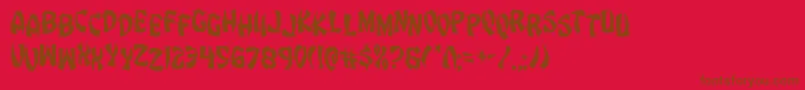 Eggrolljumble-Schriftart – Braune Schriften auf rotem Hintergrund