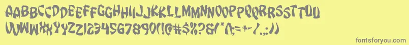 フォントEggrolljumble – 黄色の背景に灰色の文字