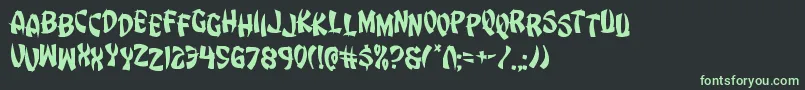 Eggrolljumble Font – Green Fonts on Black Background