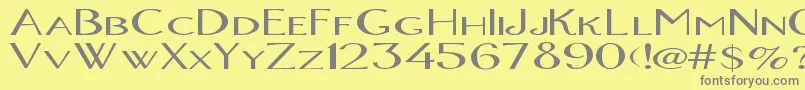 OrlandoBold-fontti – harmaat kirjasimet keltaisella taustalla