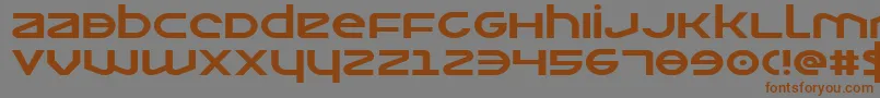フォントOpilioexp – 茶色の文字が灰色の背景にあります。
