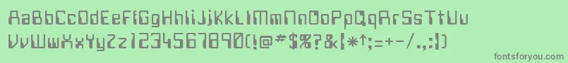 フォントJustov – 緑の背景に灰色の文字