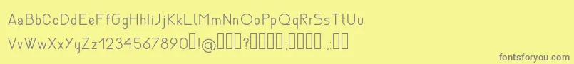 フォントNemesiaLight – 黄色の背景に灰色の文字