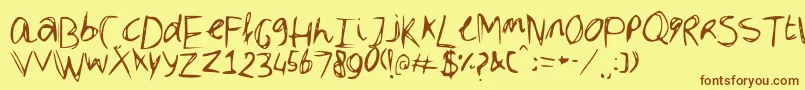 フォントDubble – 茶色の文字が黄色の背景にあります。