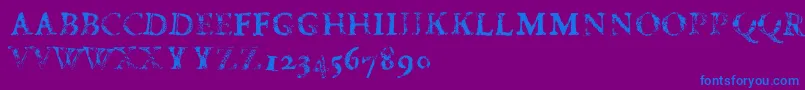 フォントFdCarimboh – 紫色の背景に青い文字