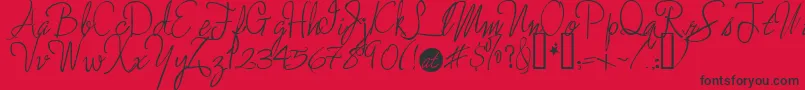 Enchanted ffy Font – Black Fonts on Red Background