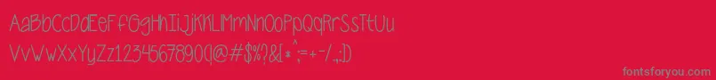 フォントCarnalaBeta – 赤い背景に灰色の文字