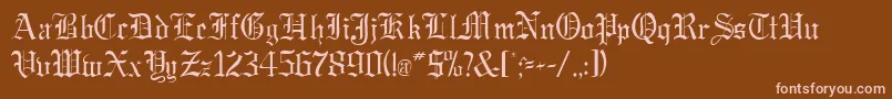 フォントGregorianRegularDb – 茶色の背景にピンクのフォント