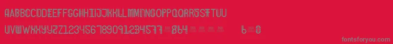 FreakShowBold-Schriftart – Graue Schriften auf rotem Hintergrund
