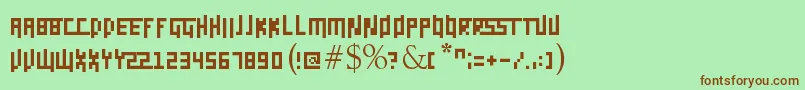Daggerpix-Schriftart – Braune Schriften auf grünem Hintergrund