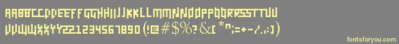 Daggerpix-Schriftart – Gelbe Schriften auf grauem Hintergrund