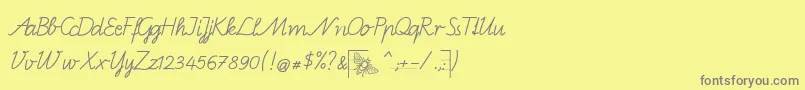 フォントBienchenB – 黄色の背景に灰色の文字